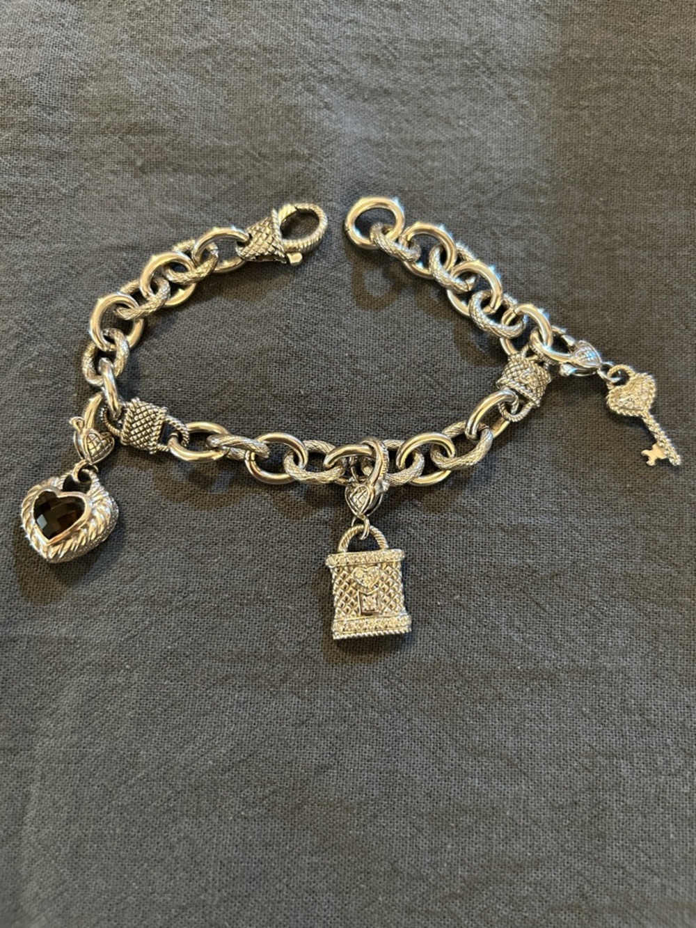 Gorgeous Judith Ripka sterling silver charm bracelet